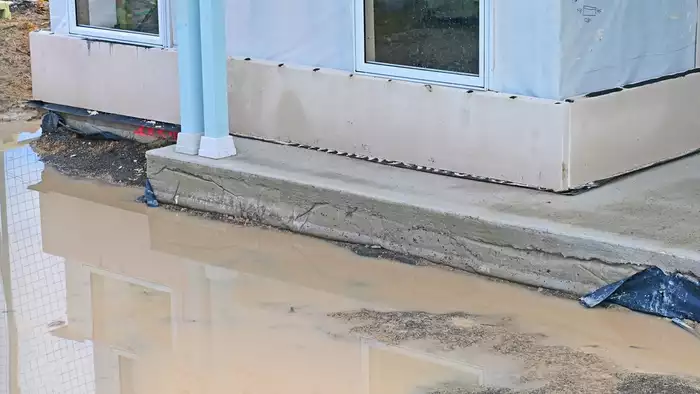 Examples of what improper drainage can look like on a home’s concrete slab.