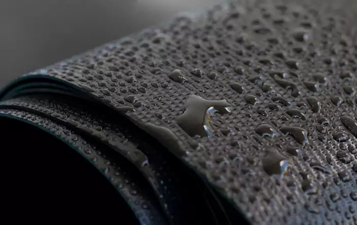 Water droplets on the waterproofing rubber membrane.